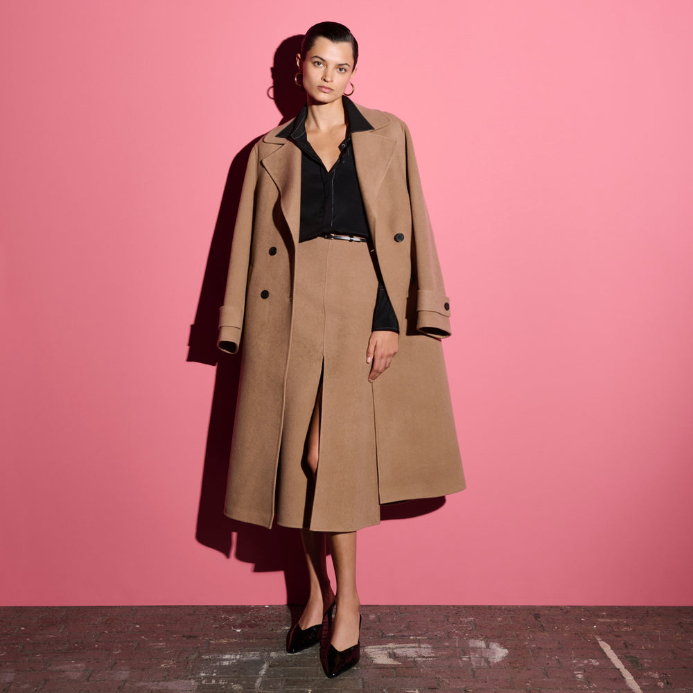 front image of a woman wearing the kerri skirt in camel