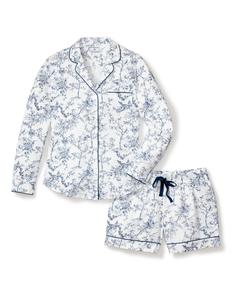 Floral pajama set with long-sleeve top and shorts on a white background