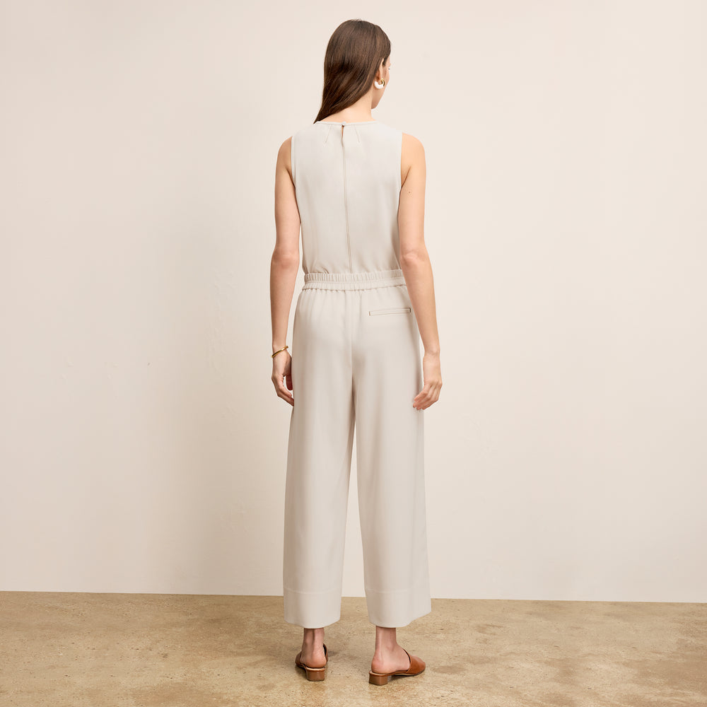 back image of a woman wearing the elena pant in eggshell