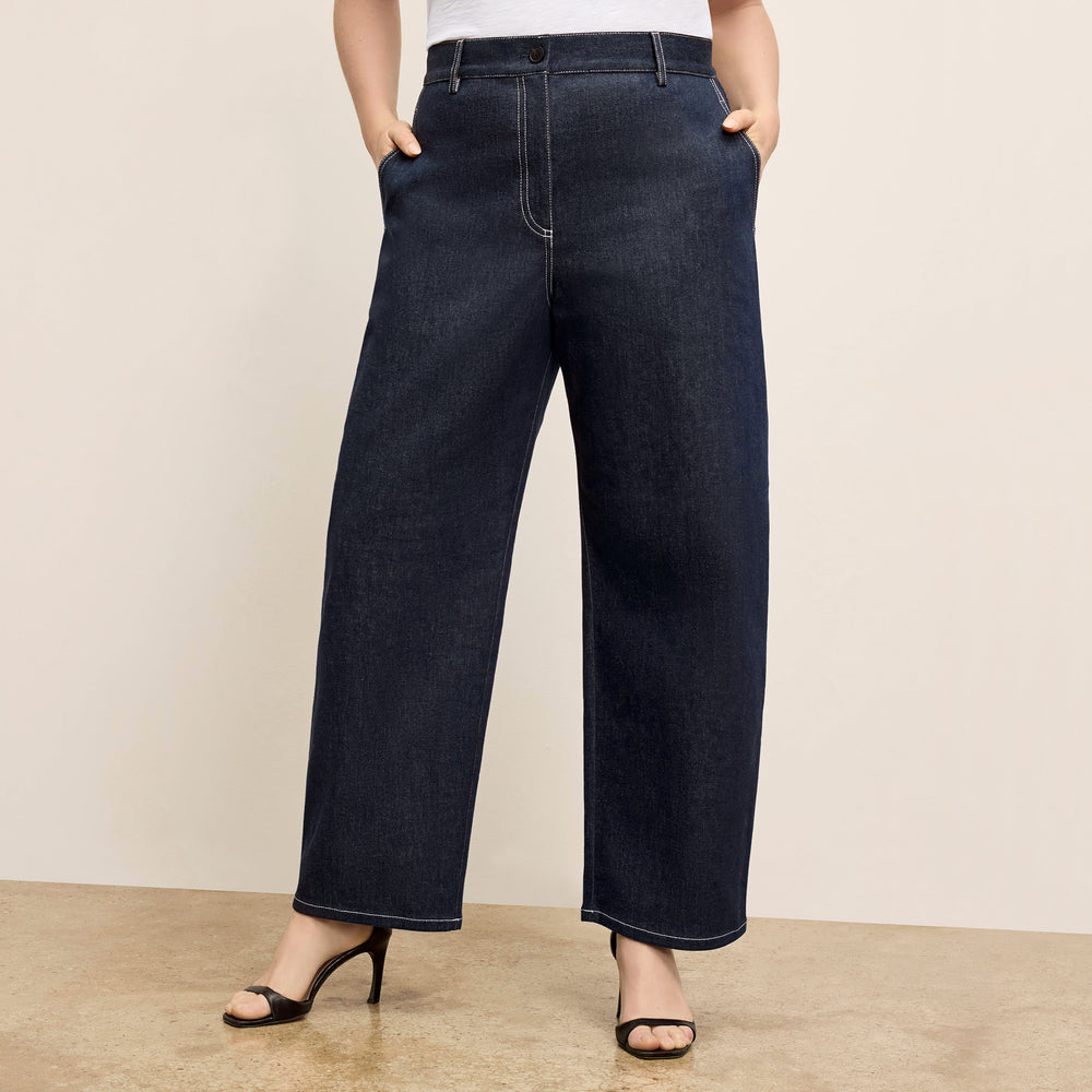 front image of a woman wearing the bari jean in midnight wash