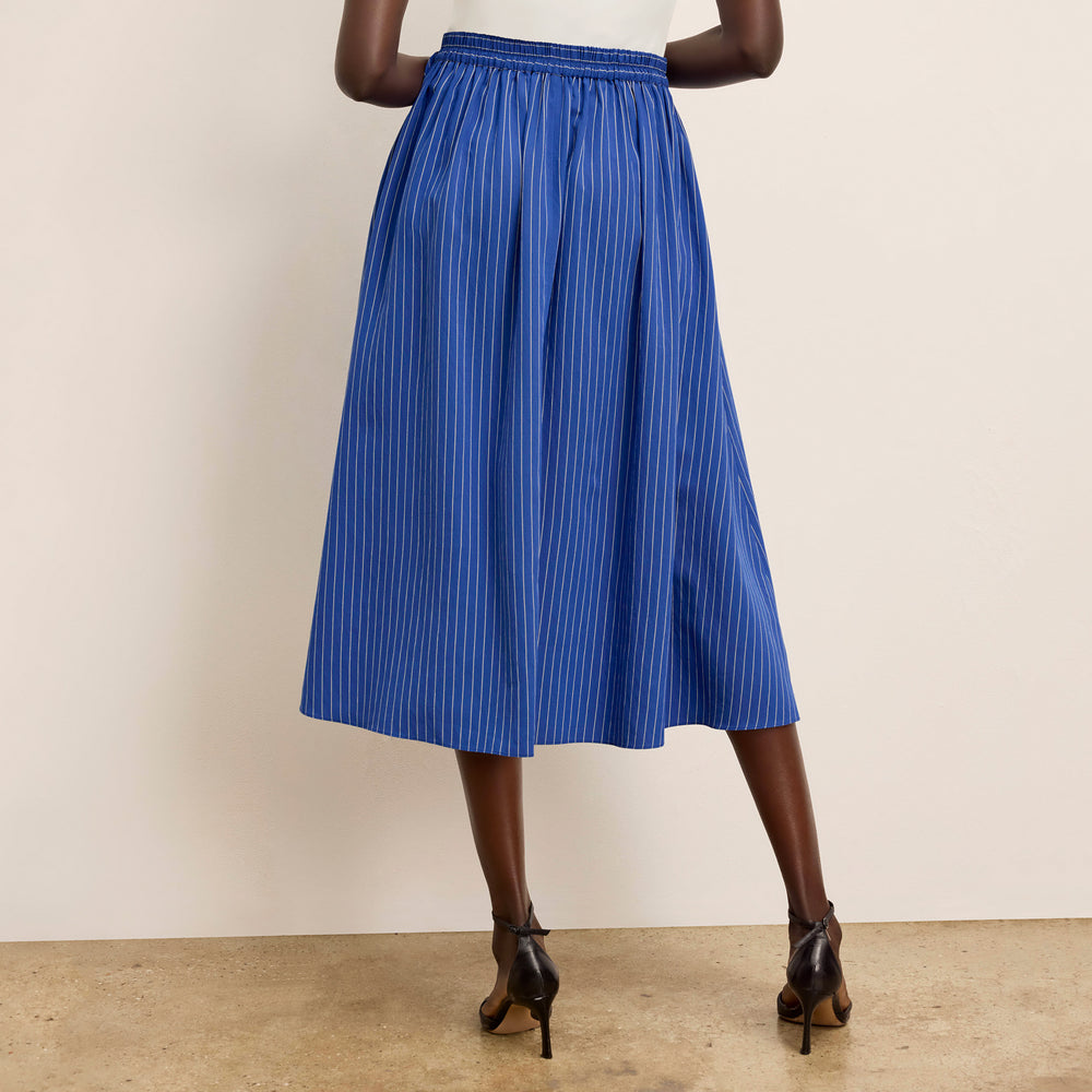 back image of a woman wearing the easton skirt in soft stripe