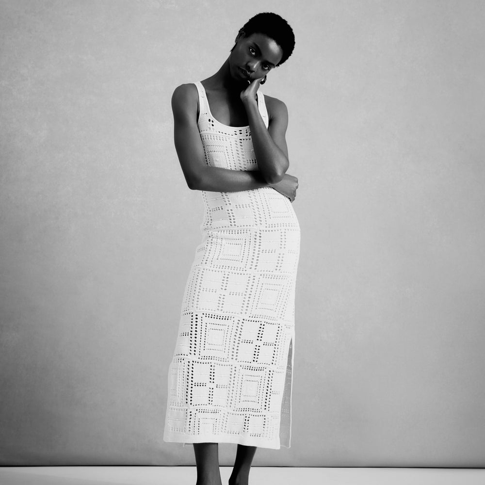 front image of a woman wearing the fina dress in natural