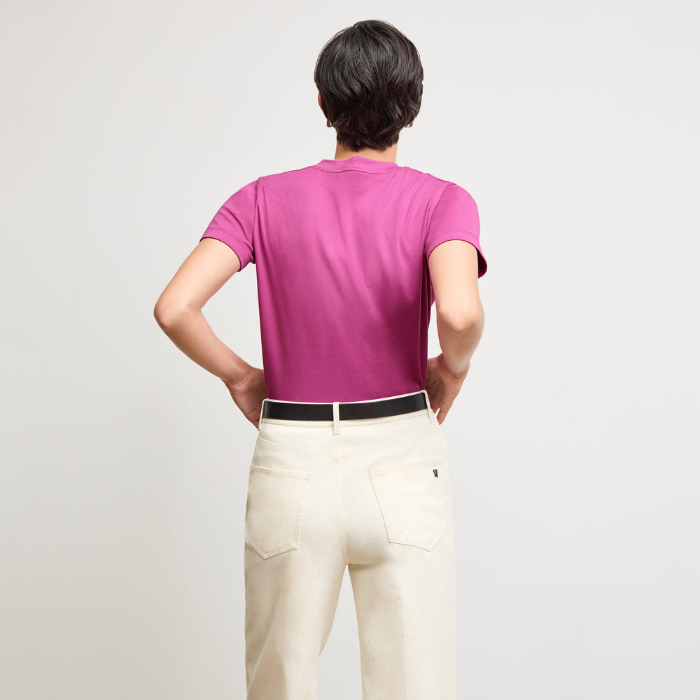 back image of a woman wearing the lee t-shirt in pink berry