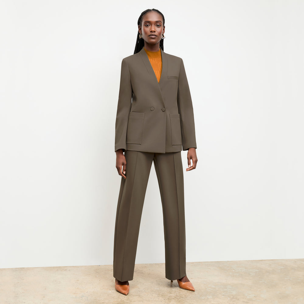 front image of a woman wearing the janette jacket in ash