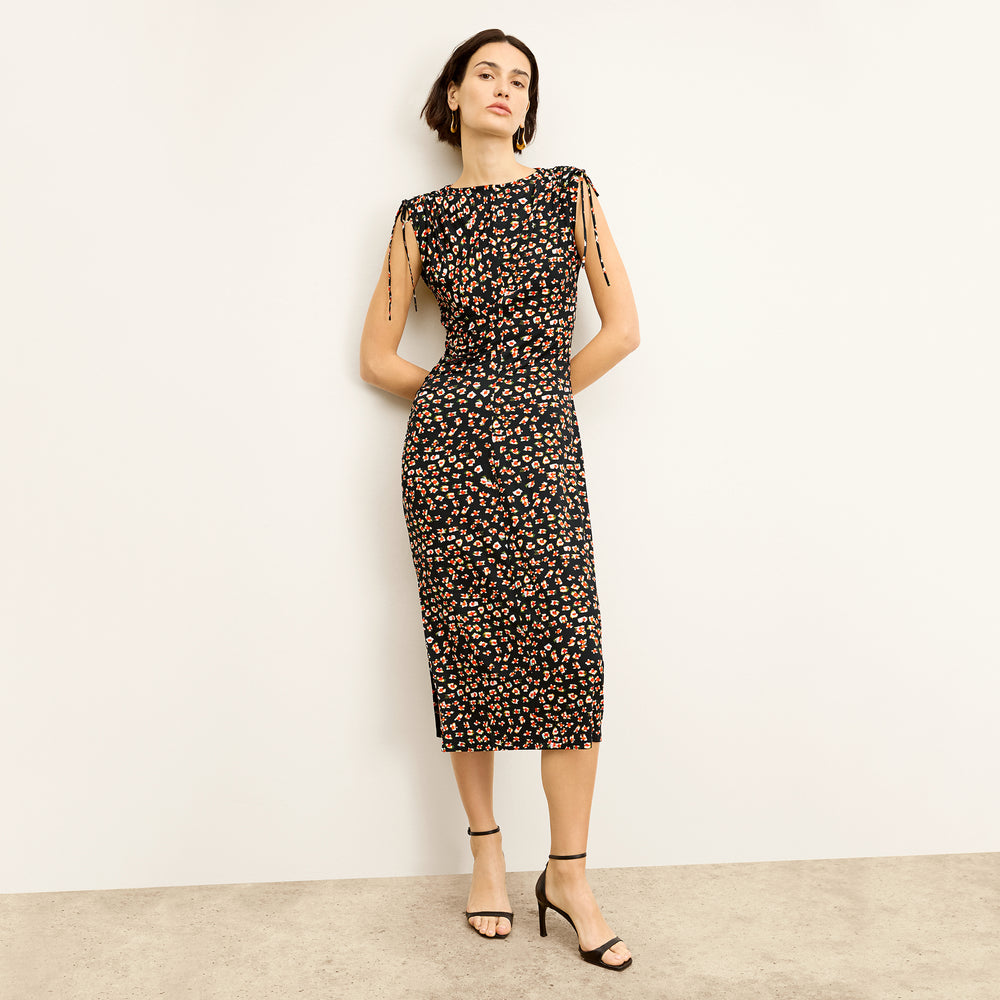 front image of a woman wearing the aisling dress in kaleidoscope print
