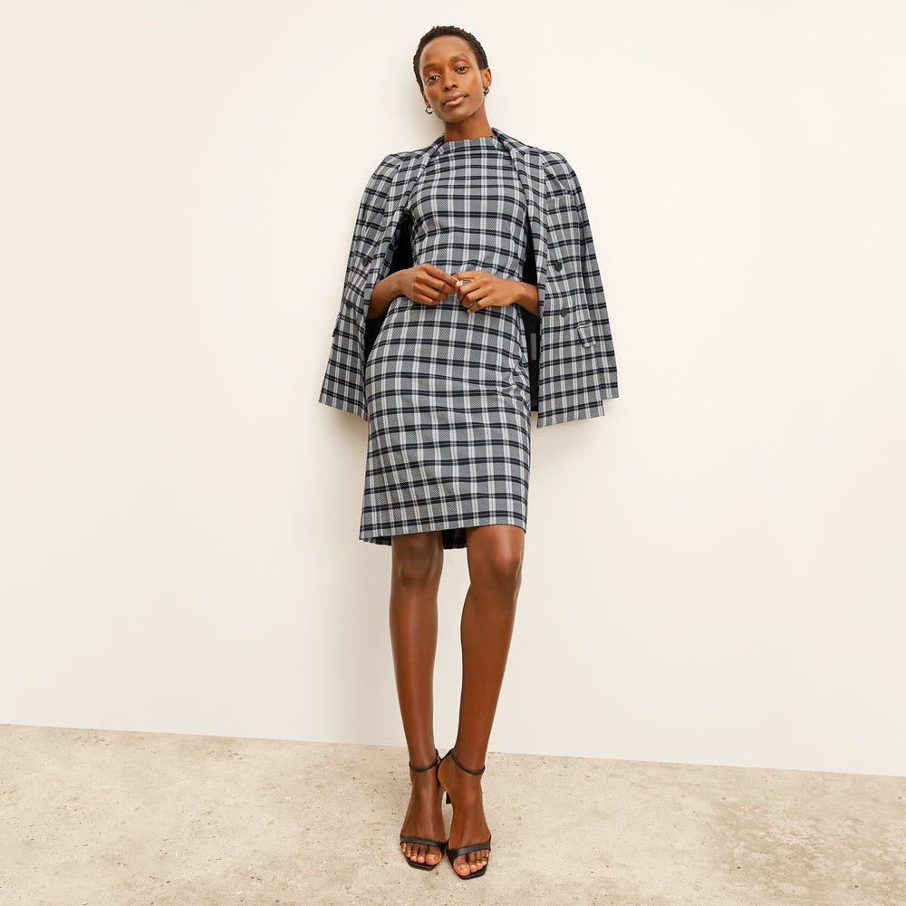 front image of a woman wearing the farnoosh dress in checkmate