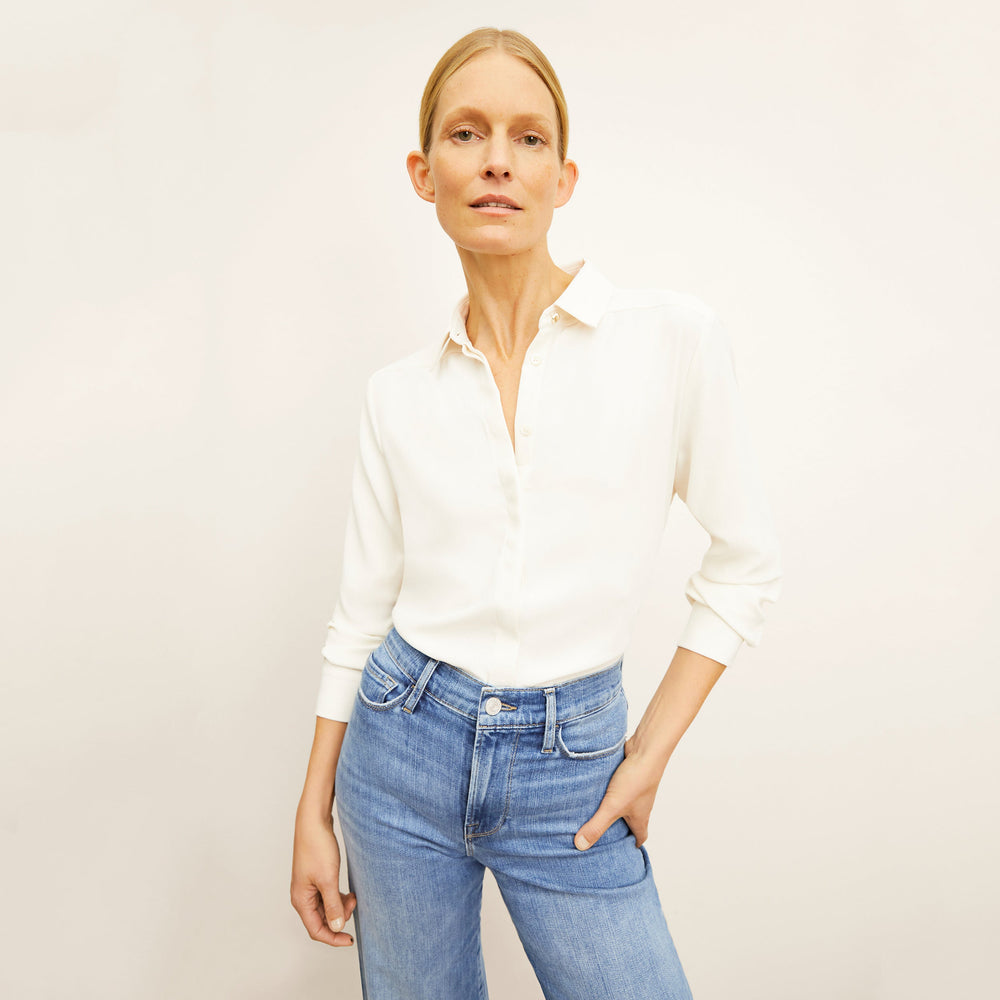 Front image of a woman standing wearing the Lagarde Shirt—Soft Wave in Alabaster