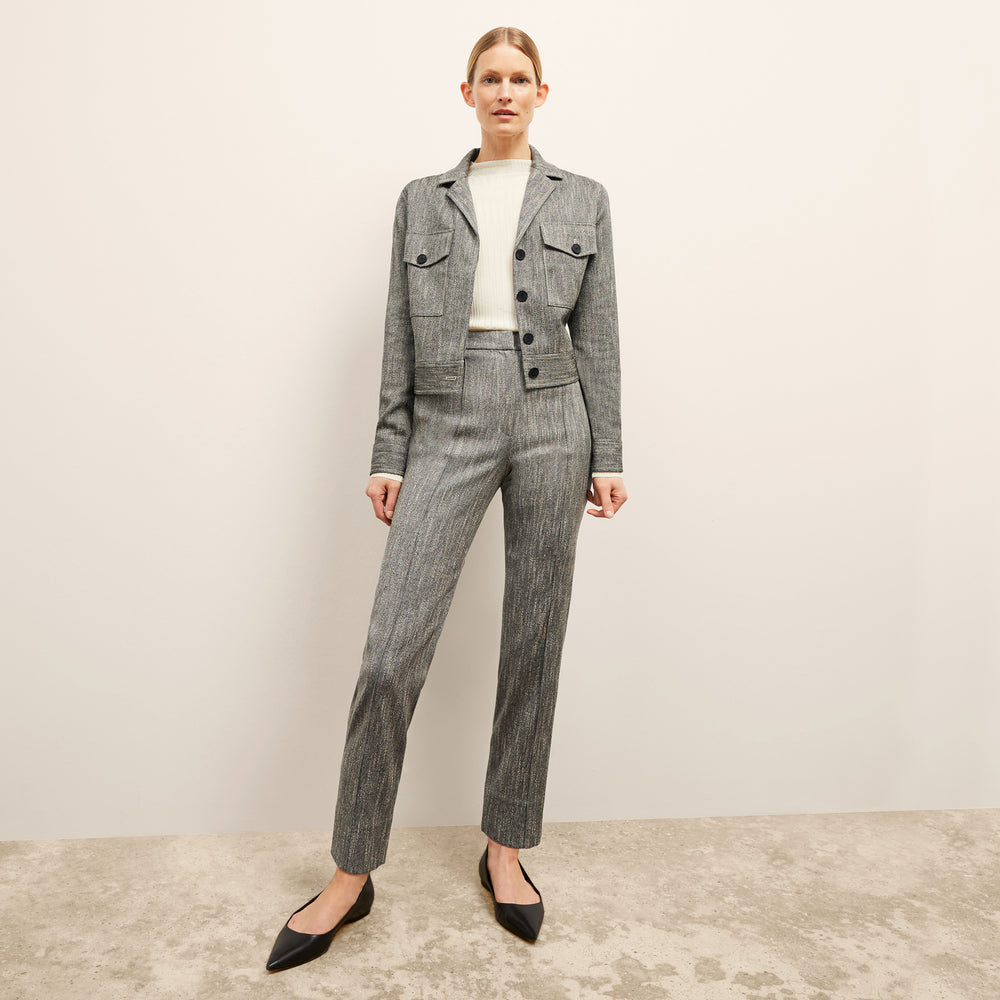 front image of a woman wearing the rhoda jacket in black/ivory