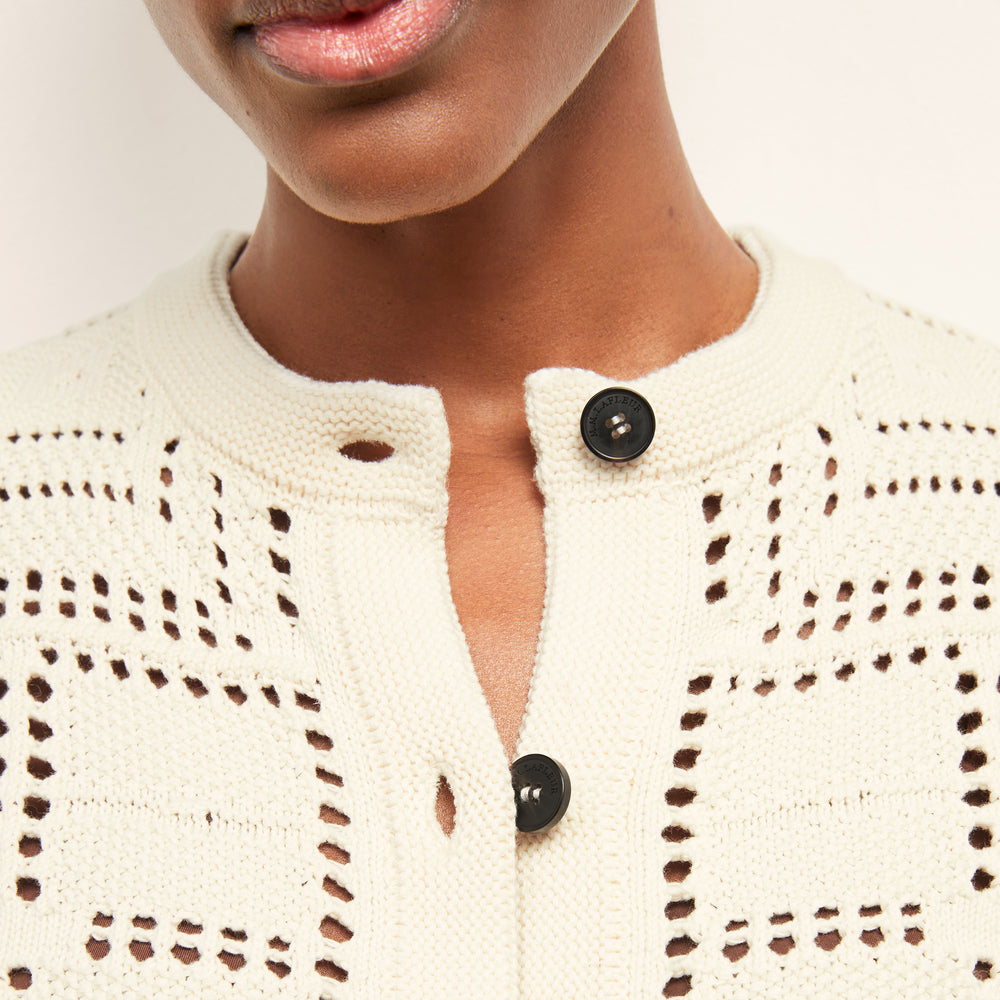Front image of a woman wearing the Zosia Top in Natural