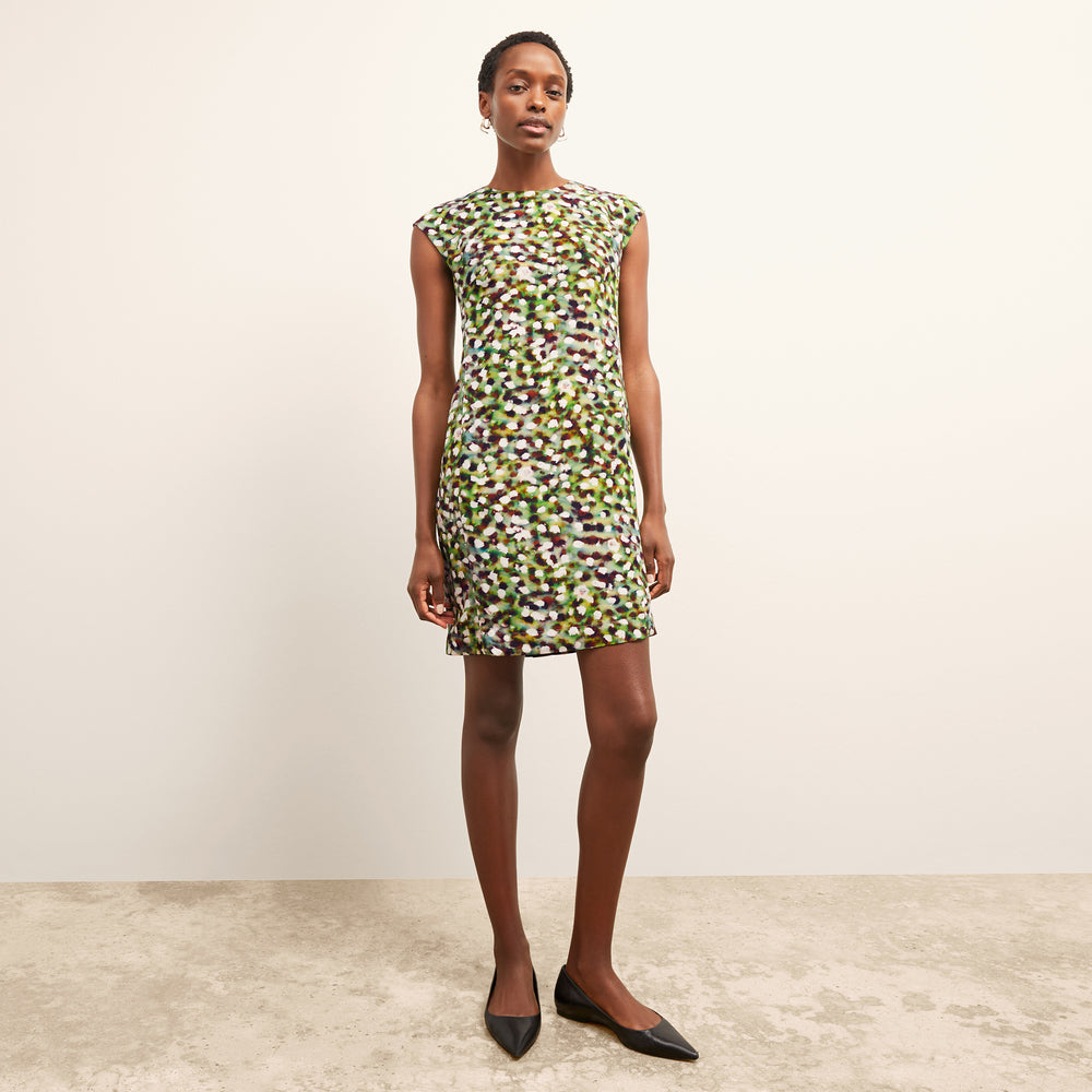 front image of a woman wearing the maaza dress in spotlight print