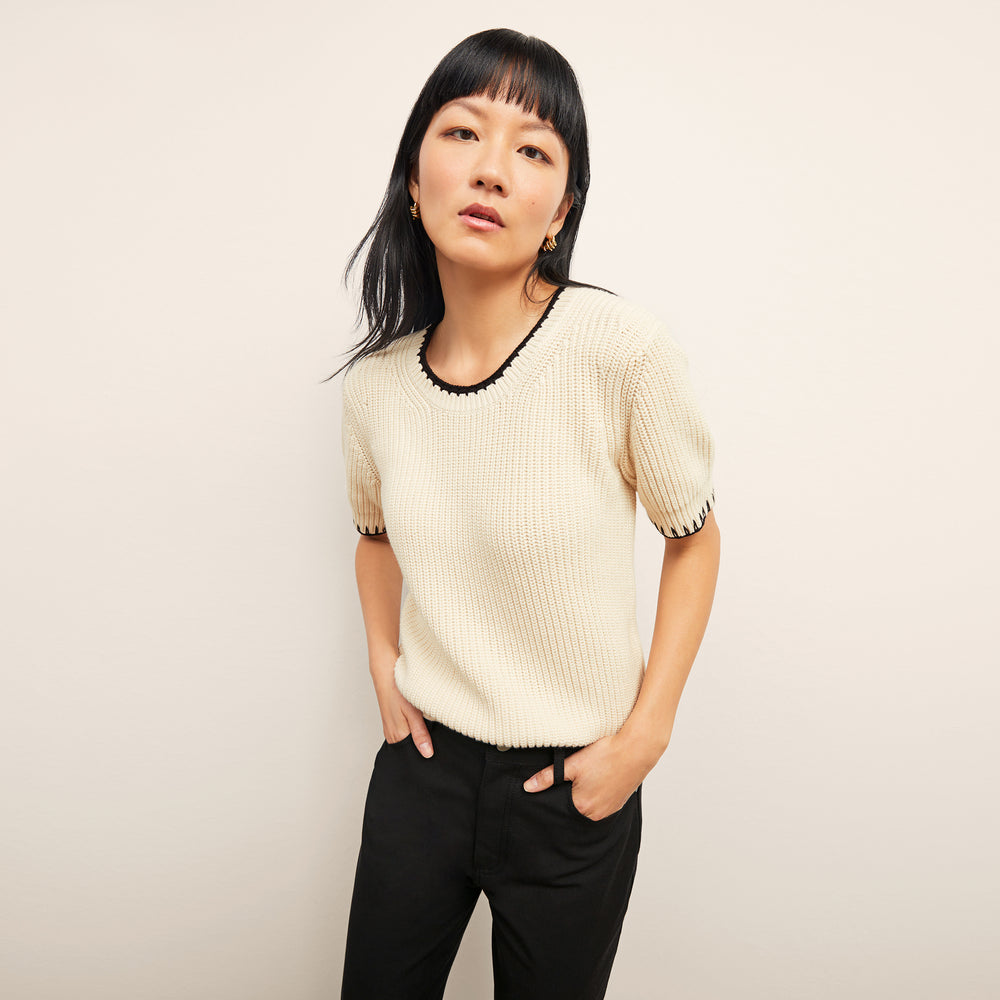 front image of a woman wearing the hallie top in contrast knit
