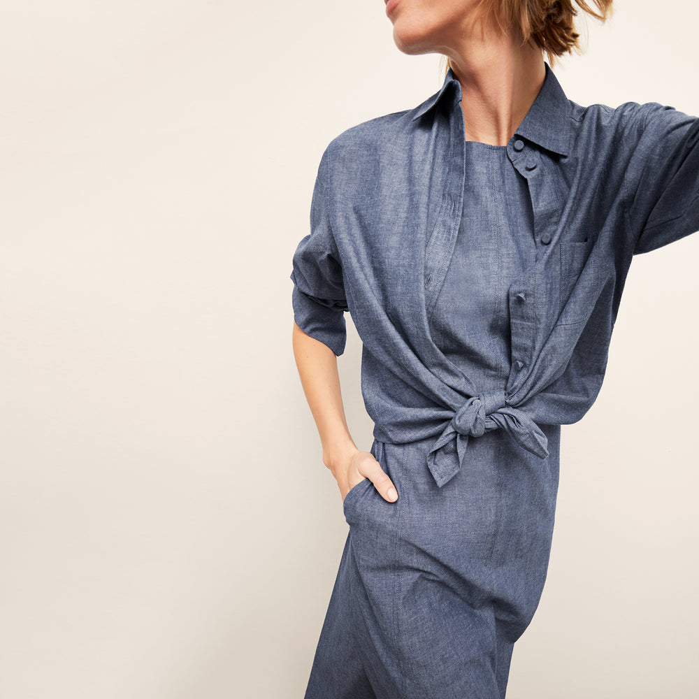 front image of a woman wearing the siobhan top in clear blue