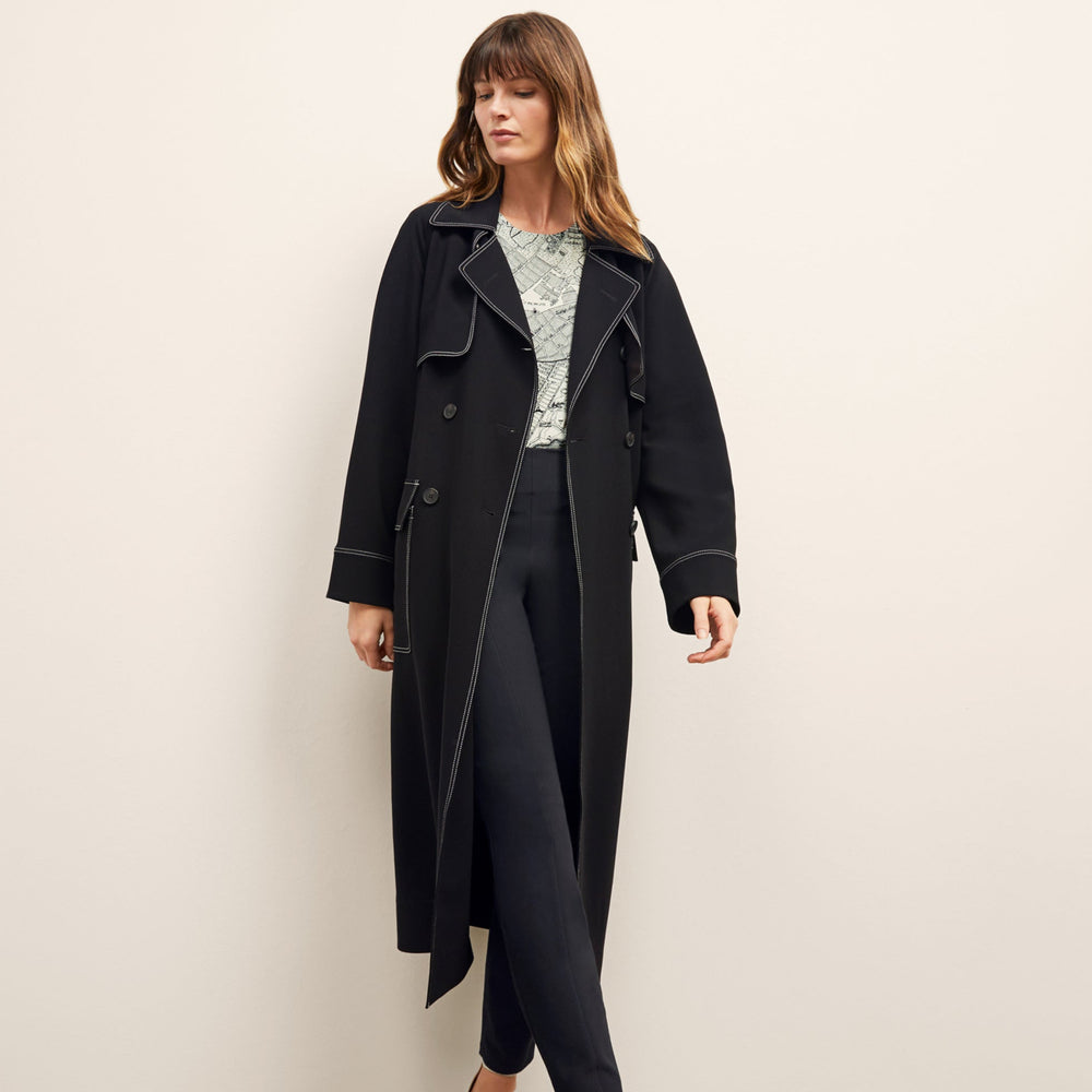 front image of a woman wearing the frankie jacket in black