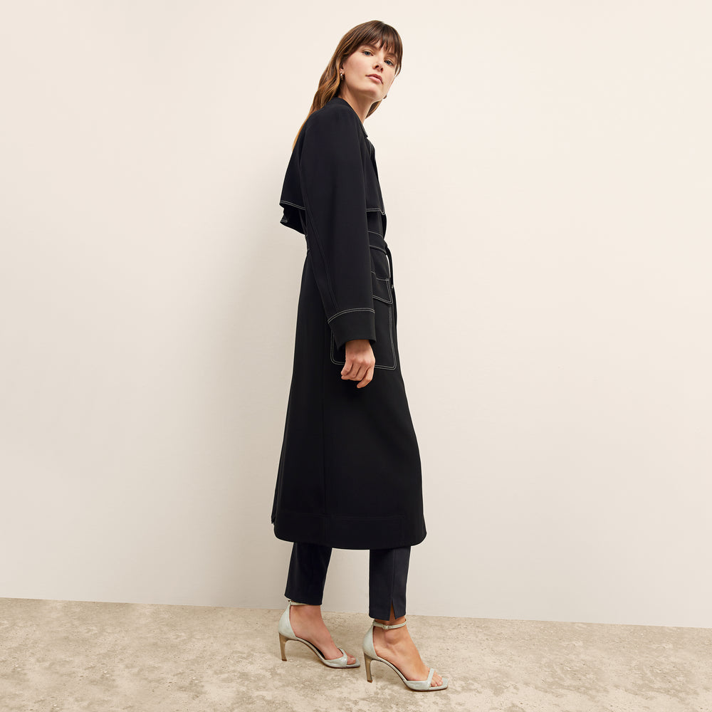 side image of a woman wearing the frankie jacket in black