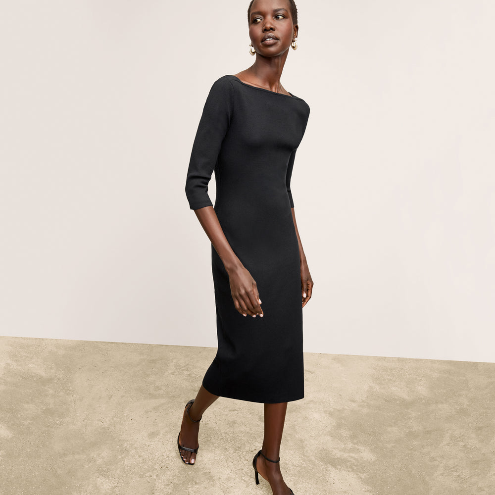 Front image of a woman wearing the Zana Dress in Black