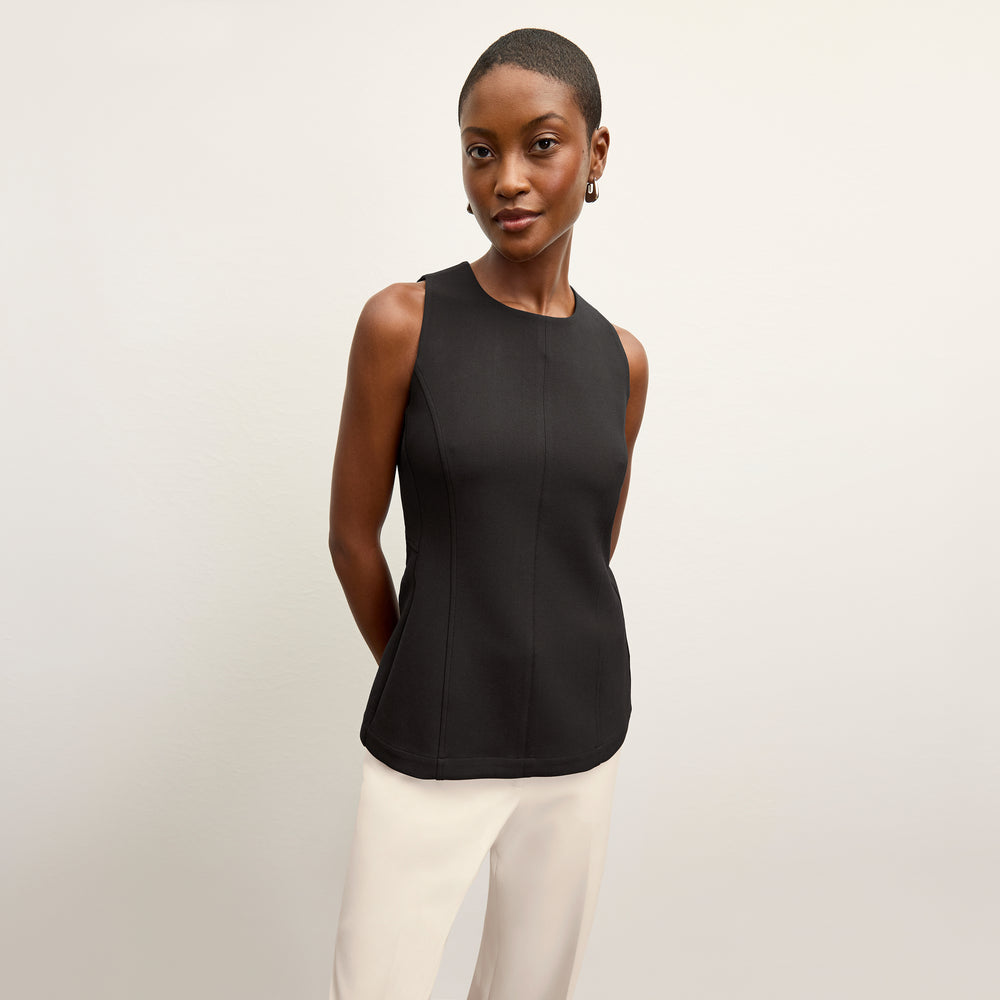 front image of a woman wearing the lucia top in black