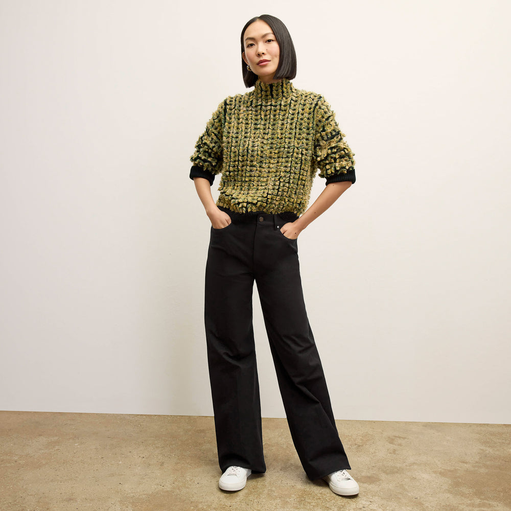 front image of a woman wearing the Rajni Sweater in multi