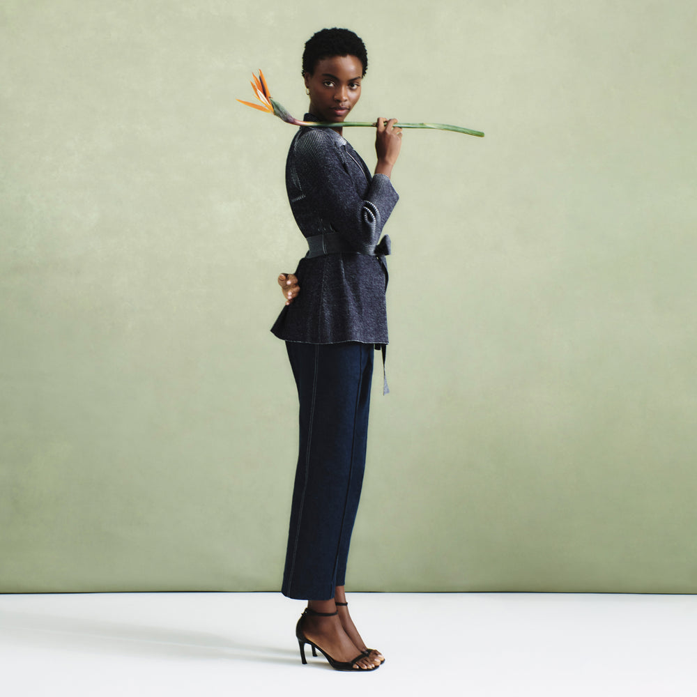 front image of a woman wearing the christy pant in dark wash