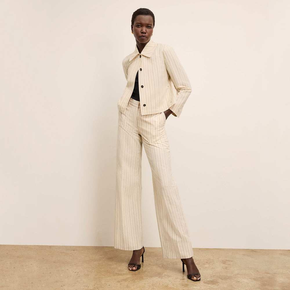 front image of a woman wearing the tinsley pant in linen stripe