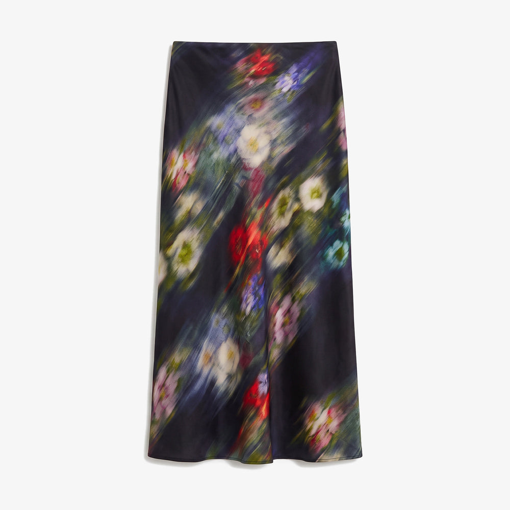 A black midi skirt featuring a vertical, painterly brushstroke pattern with abstract floral elements in red, white, yellow, and blue, shown against a plain white background.