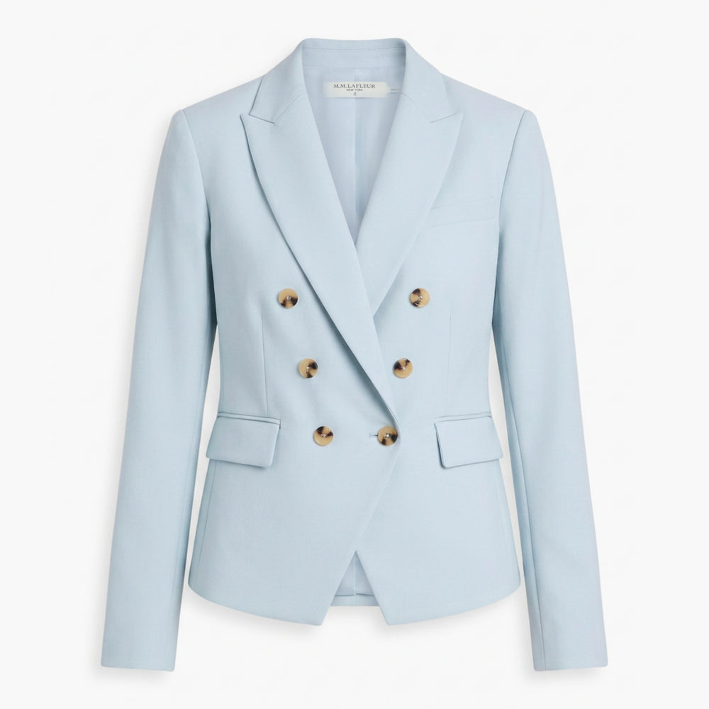 Light blue blazer with gold buttons on a white background