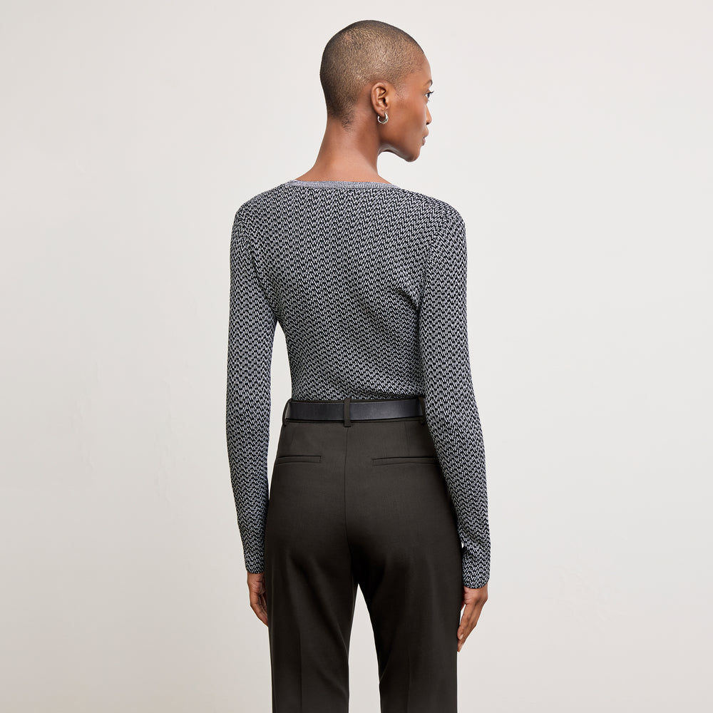 back image of a woman wearing the rae top in mini chevron knit