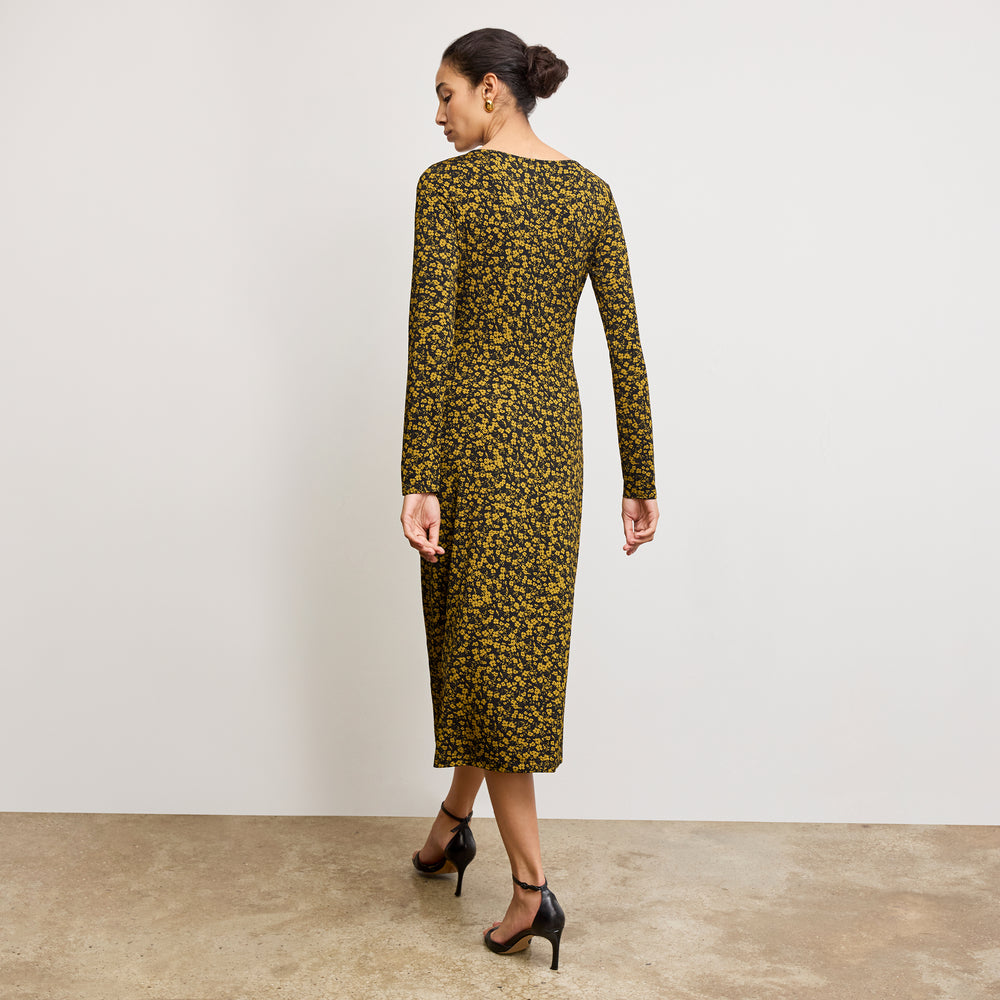 back image of a woman wearing the axam top in bloom print