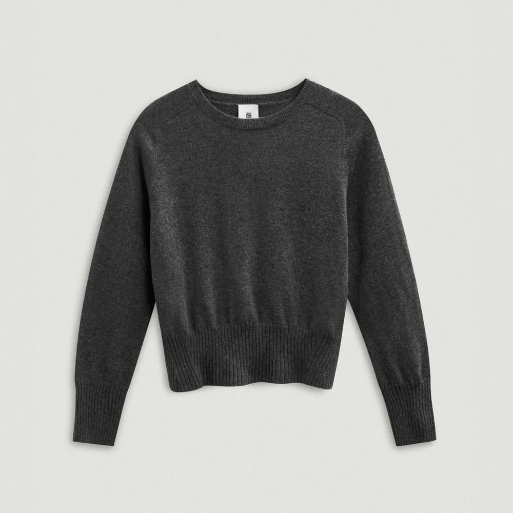 Dark gray sweater on a light gray background