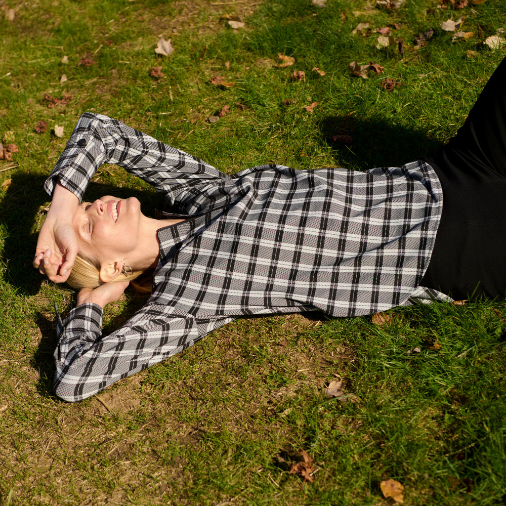 front image of a woman wearing the tully top in checkmate