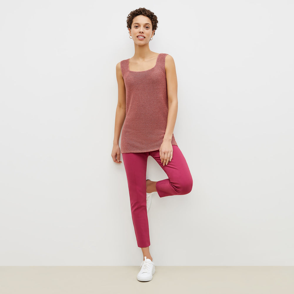 Front image of a woman standing wearing the adele tunic in copper