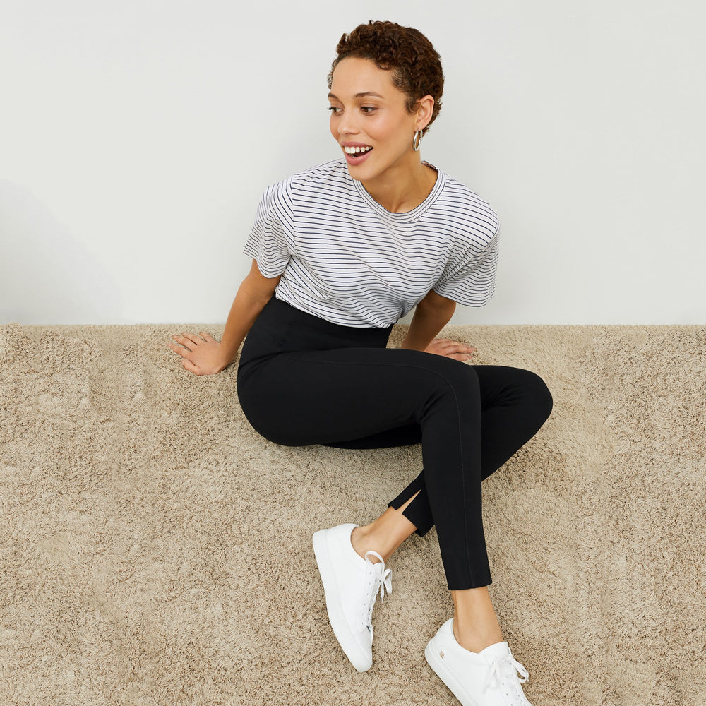 image of woman wearing M.M.LaFleur x Koio Capri Low-Top SneakersāLeather White