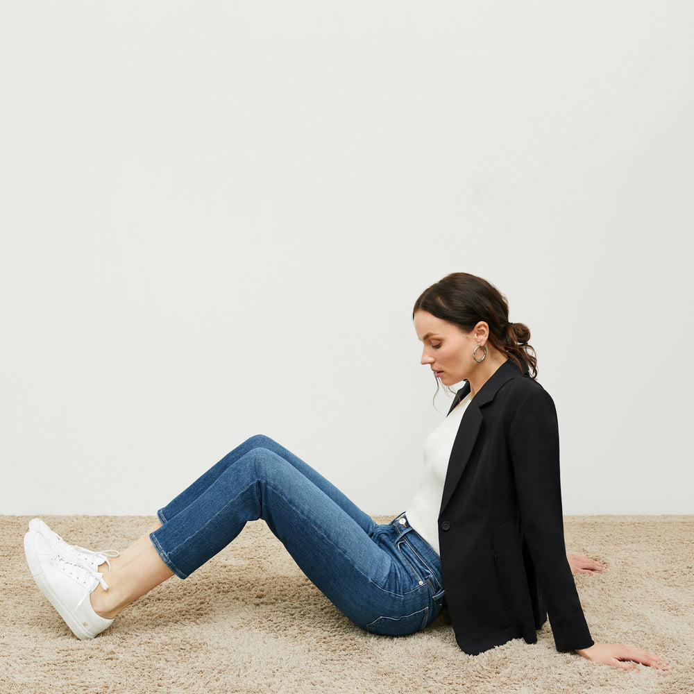 image of woman wearing M.M.LaFleur x Koio Capri Low-Top SneakersāLeather White