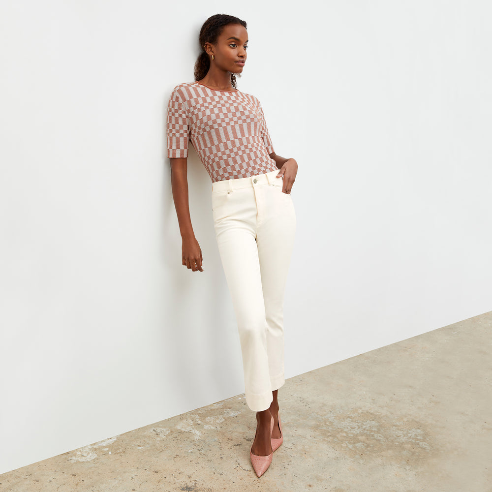 Front image of a woman wearing the Charli Top - Checkered Knit in Red Clay / Natural