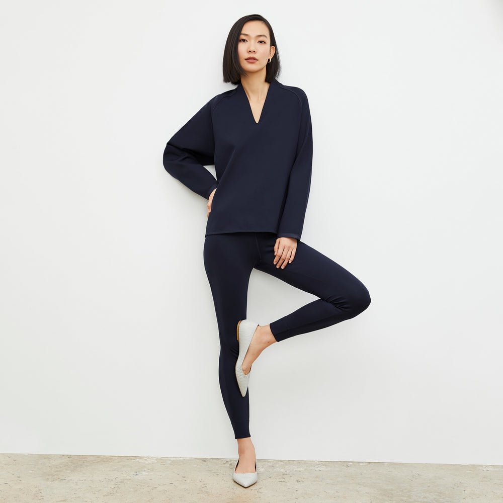 Front image of a woman wearing the Shawn Sweatshirt - Light Scuba in Space Blue