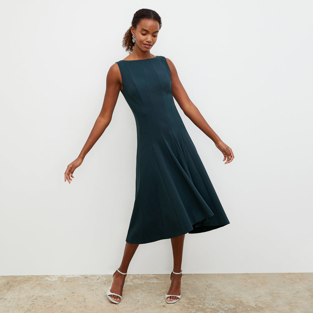 Front image of a woman wearing the Gabriella Dress in Deep Sea