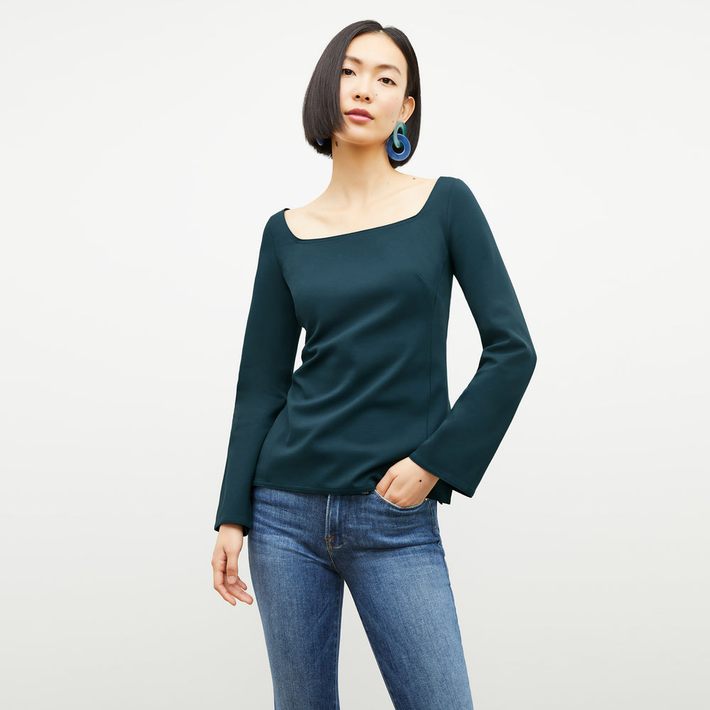 Front image of a woman wearing the Jace Top in Deep Sea