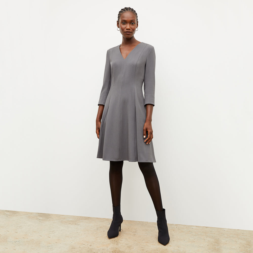 Image of a woman wearing the Erica Dress in Steel Gray