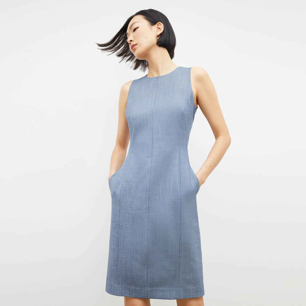 Front image of a woman wearing the constance dress in indigo and white