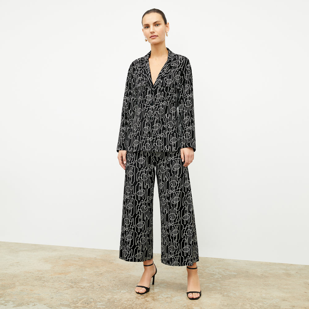 front image of a woman wearing the zhou culotte in symphony print