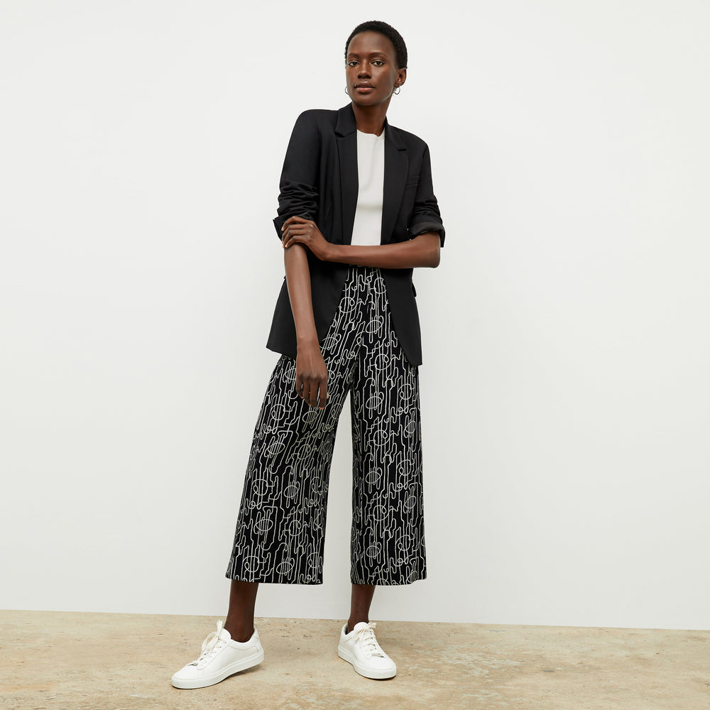 front image of a woman wearing the zhou culotte in symphony print