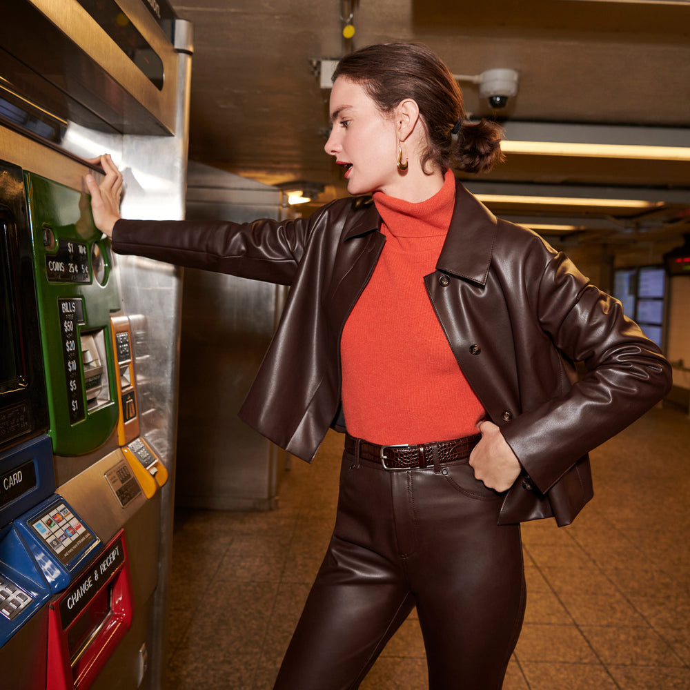 woman wearing the nicky jacket in brown
