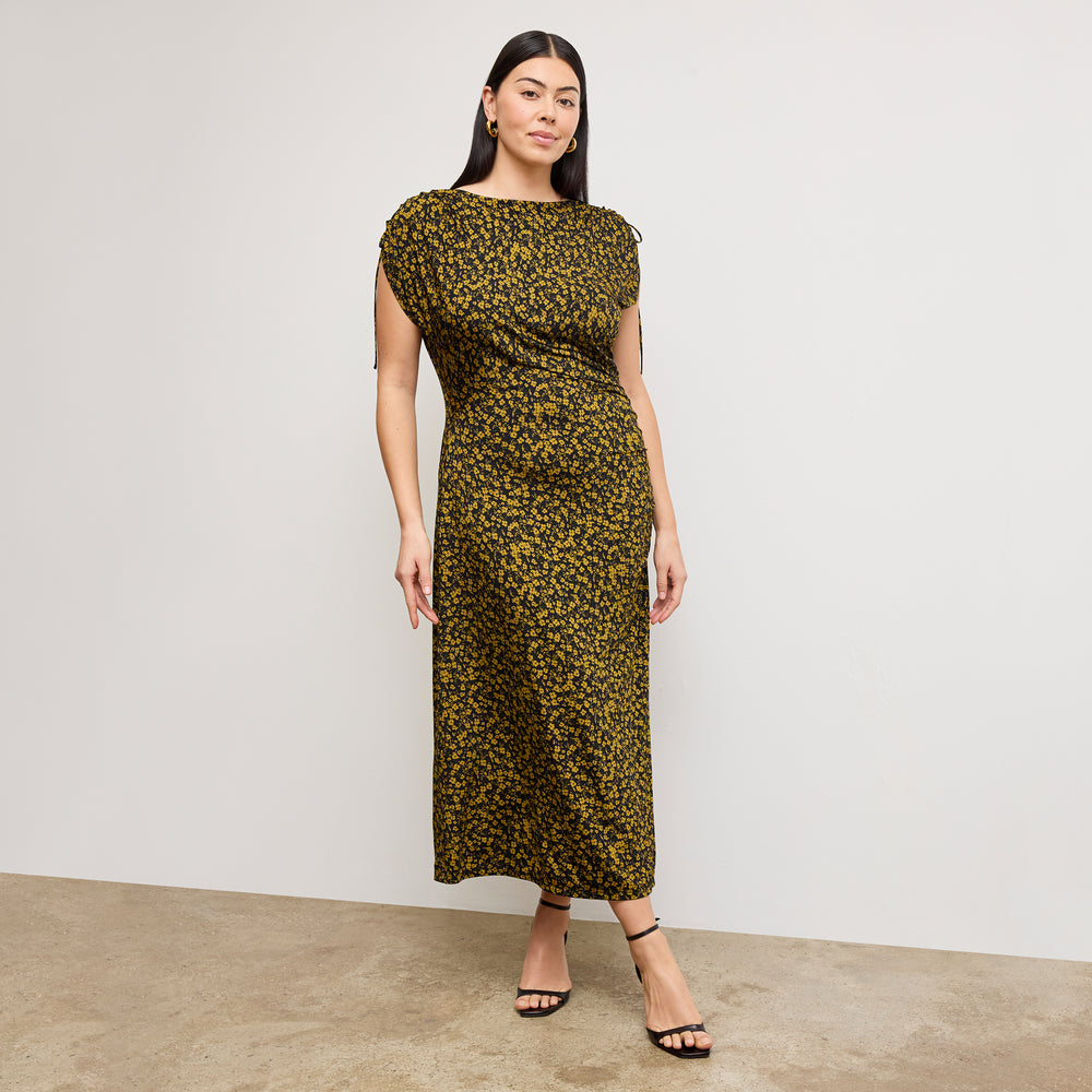 front image of a woman wearing the aisling dress in bloom print