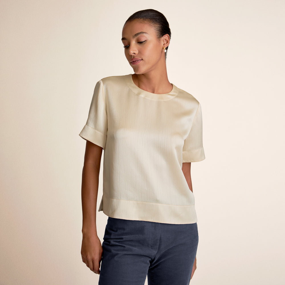 Woman wearing Didion Top in Ivory