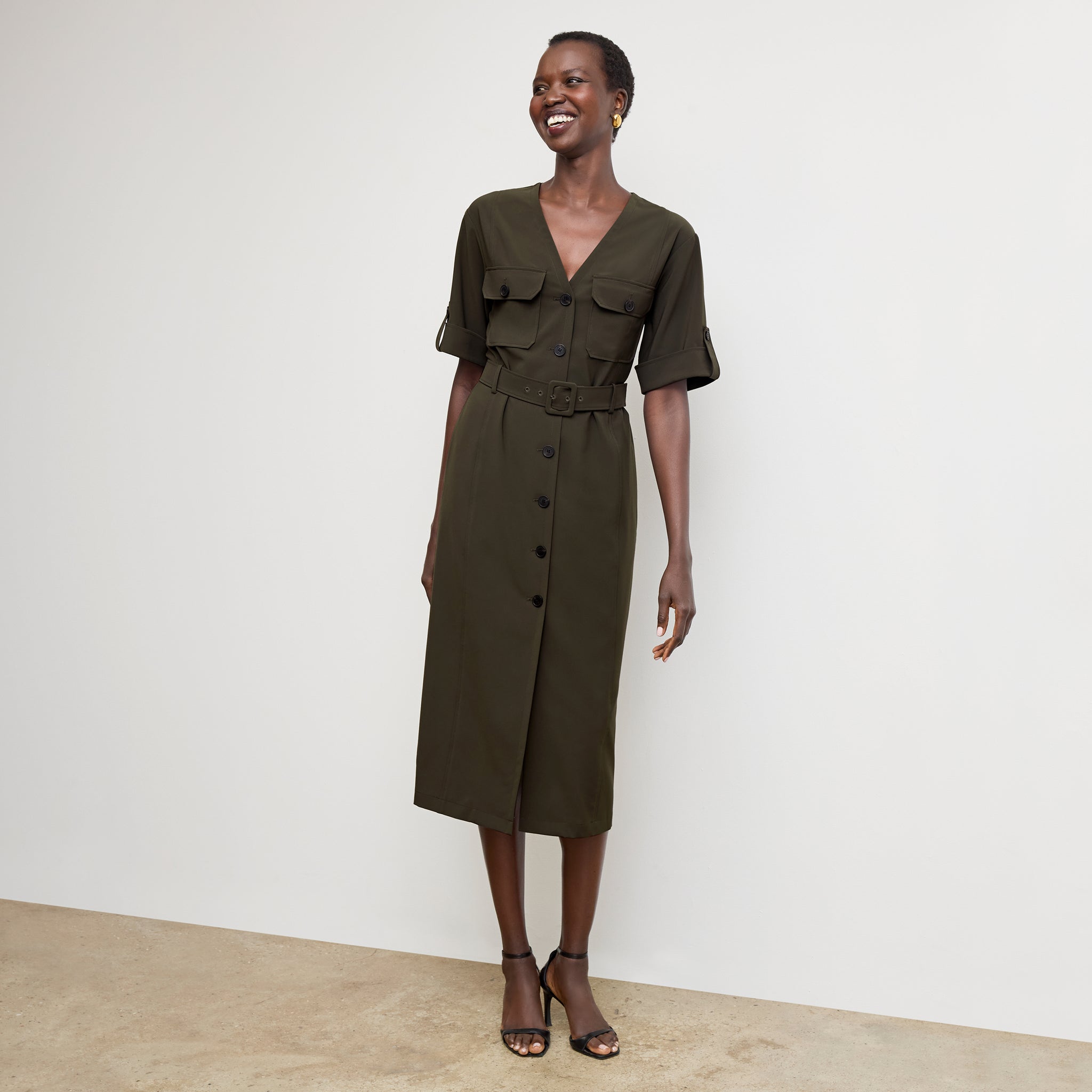 Front image of a woman wearing the Artemis Dress in Olive 