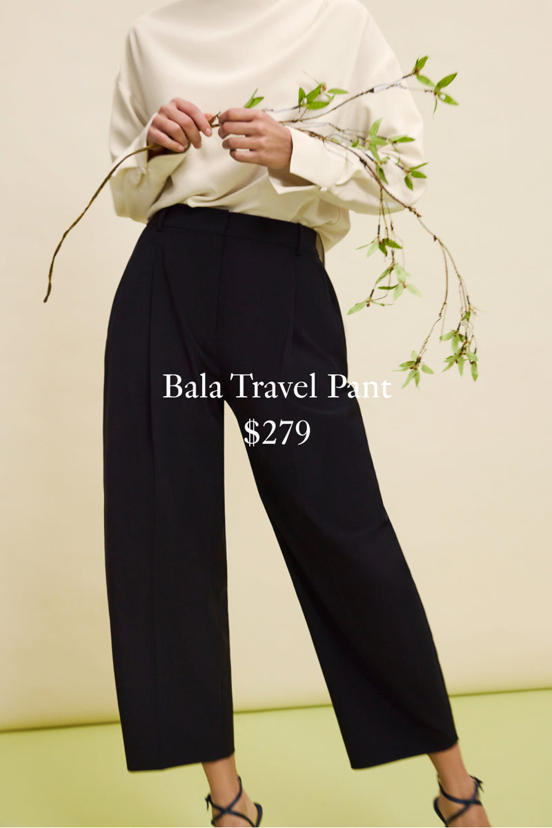 Person wearing black travel pants with a white top against a light background

BALA TRAVEL PANT
$279