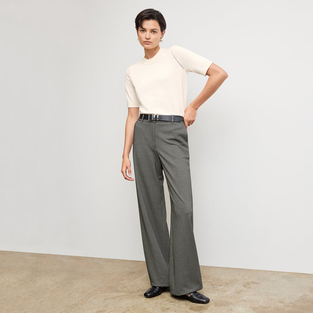 front image of a woman wearing the becca top in ivory