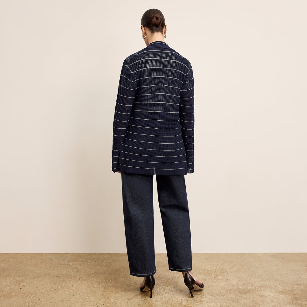 back image of a woman wearing the cody jardigan in dot knit