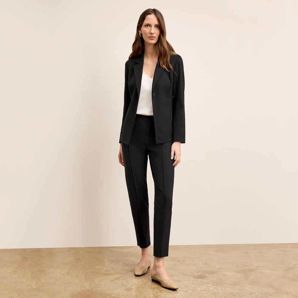 Front image of a woman standing wearing the Colby Jogger in Black