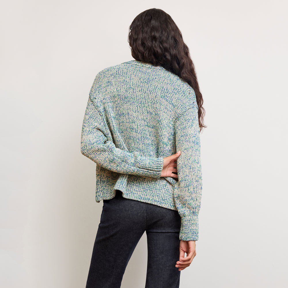back image of a woman wearing the dakota sweater in multi