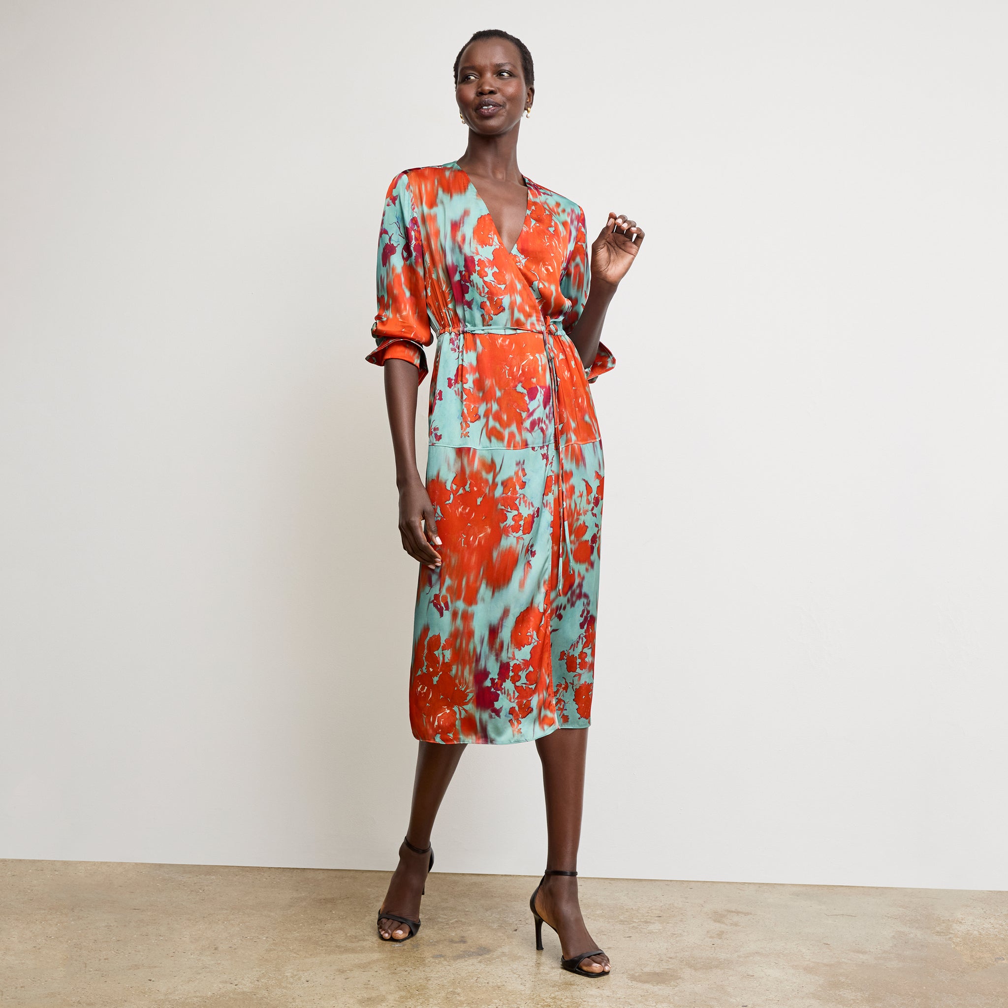 Front image of a woman wearing the Deana Dress in Ombre Floral Printed Viscose 
